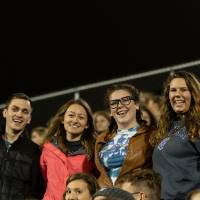 4 students taking part in the GVSU homecoming football game